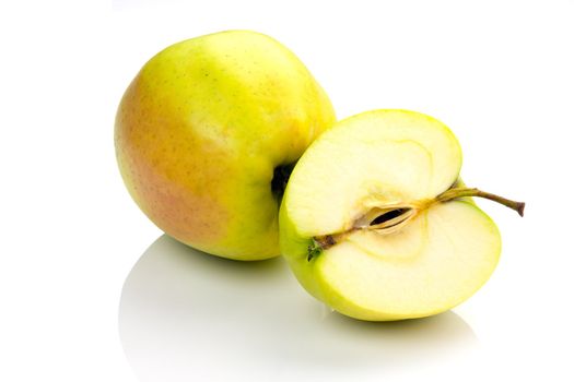 whole and sliced ​​apples on a white background