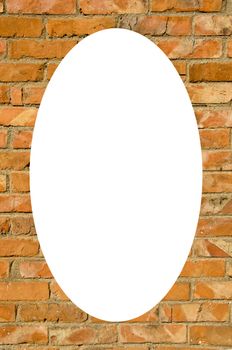 Isolated white oval place for text photograph image in center of red brick wall. Fragment of wall with immured window.