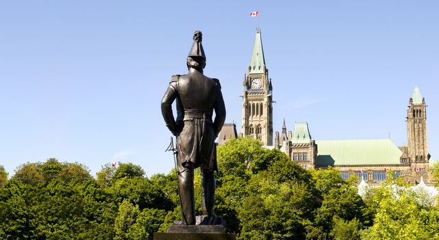 A statue of Colonel By created by Joseph-Émile Brunet stands in nearby Major's Hill Park, across from Parliament Hill in Ottawa, Canada.