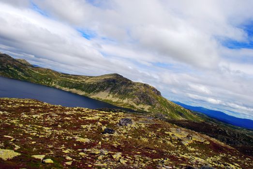 Gaustatoppen is the highest mountain in the county Telemark in Norway. The view from the summit is impressive, as one can see an area of approximately 60,000 km², one sixth of Norways mainland.