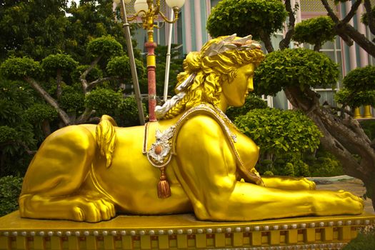 Stock Photo - Gold Sculpture statue at temple, Thailand.