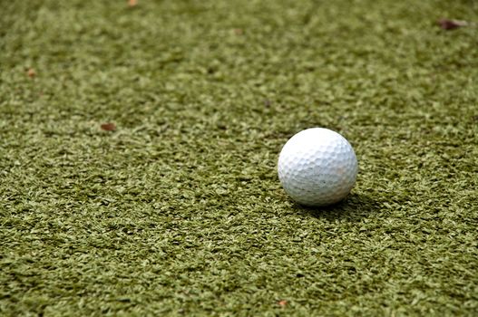 golf ball on green grass