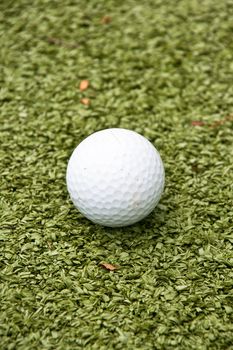 golf ball on green grass