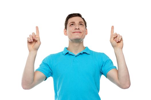Caucasian man point and looking upwards. All on white background