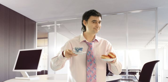 businessman in the office wants coffee break