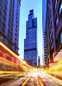 Willis Tower and modern city at night with freeway traffic