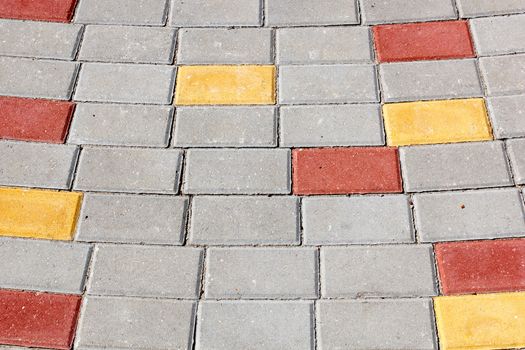 walkway paved from the colorful bricks