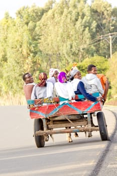 Dilla, Ethiopia – JULY 18: People jam packed in a carriage used as the local public transportation on July 18, 2012 Dilla, a small rural town in Ethiopia.