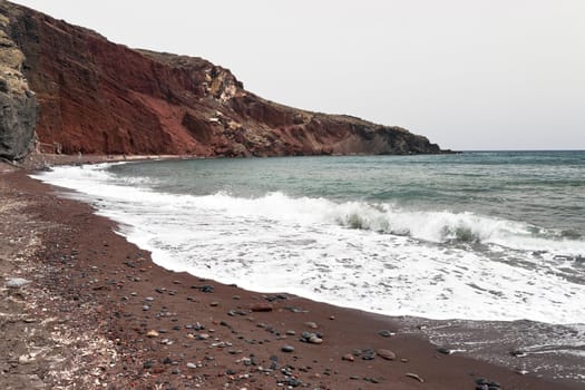 Famous Santorini Red beach with incoming waves