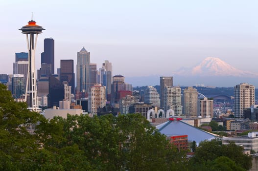 Seattle skyline at sunset and Mt.Rainier.