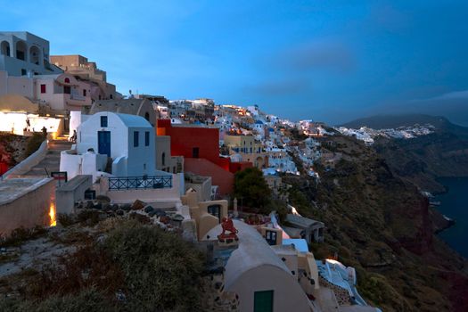 Blue twilight in Santorini Ia village with typical architecture