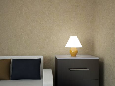 A small lamp on the bedside table