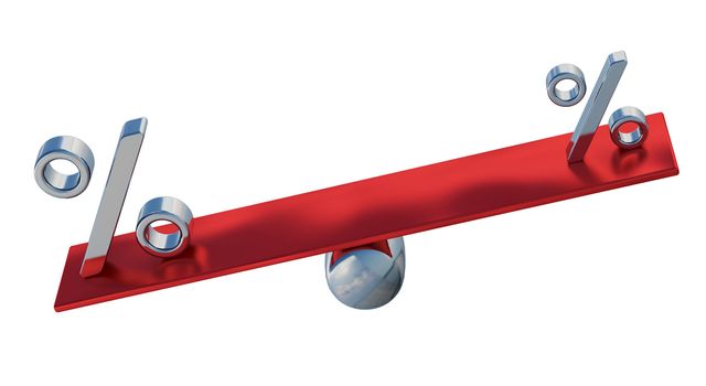 The metallic percent sign on the balance