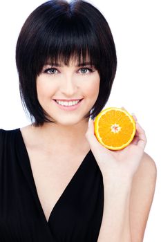 Pretty woman holding slice of orange, isolated on white