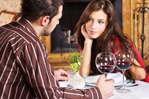 Young couple in love and red wine