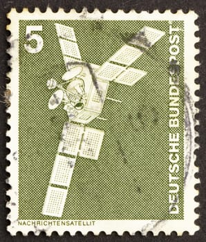 GERMANY - CIRCA 1975: a stamp printed in the Germany shows Satellite, circa 1975