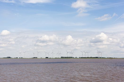 Wind turbines near river