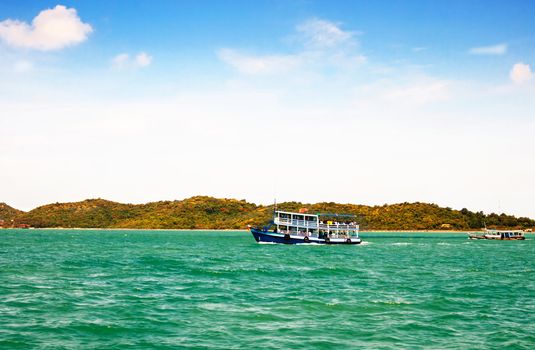 wooden ferry boat in the sea of thailand