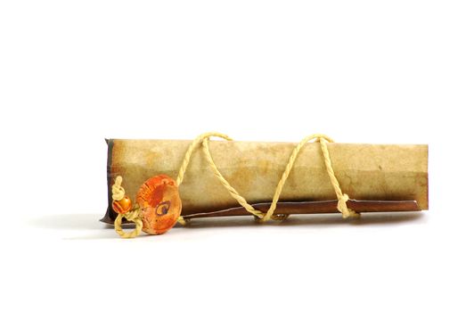 old rolled paper isolated on a white