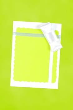 Greeting card isolated on the green background