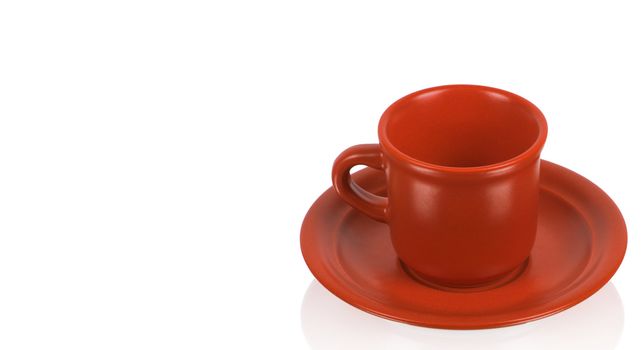 Red cup on a red saucer isolated on white background