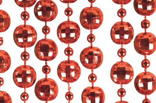 Background made of a brilliant celebratory beads of red color