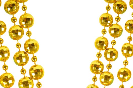 Background made of a brilliant celebratory beads of golden color