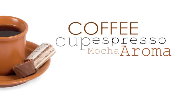 Closeup shot of freshly prepared cup of italian espresso with cinnamon and candy over white background