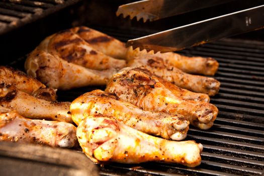 Chicken drumsticks on the grill