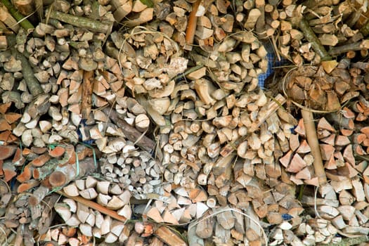 Pile of wood logs Stack ready for Fire in winter