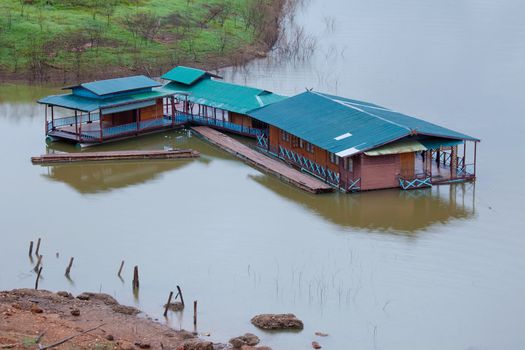 building houseboat on the lake in Thailand