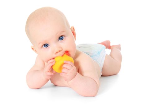 Newborn child playing with a rubber duck. All isolated on white background.