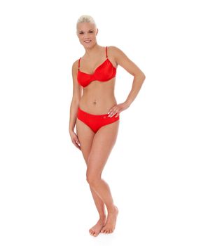 Attractive woman in red bikini. Isolated on white background.