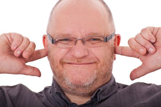 Attractive elderly man suffering from tinnitus. All on white background.