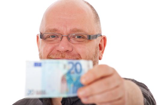 Attractive elderly man showing 20 Euro note. All isolated on white background.