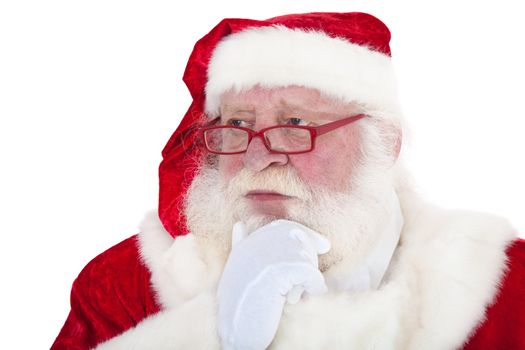 Santa Claus in authentic look deliberates a decision. All on white background.
