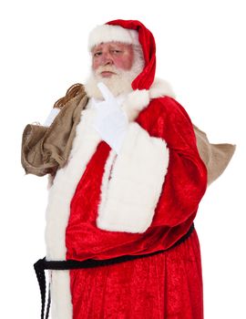 Santa Claus in authentic look in bad mood. All on white background.