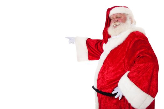 Santa Claus in authentic look pointing with finger. All on white background.
