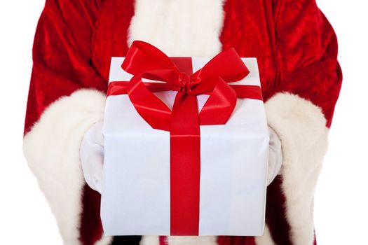 Santa Claus hands over fine wrapped present. All on white background.