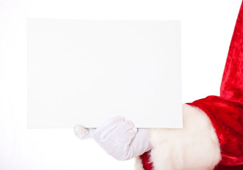Santa Claus in authentic look holding blank white sign. All on white background.