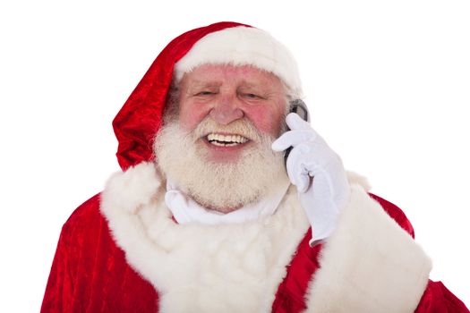 Santa Claus in authentic look making a phone call. All on white background.
