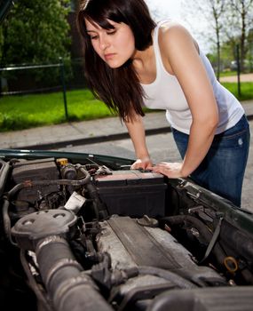 Attractive young womans car broke down.