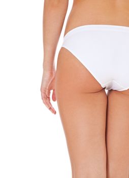 Attractive buttocks of a female person. All on white background.