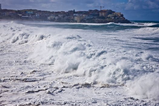 Turbulent waves crashing ashore during a storm at Bondi Beach in Sydney, Australia