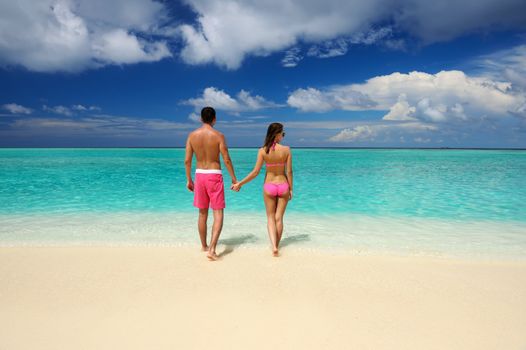 Couple on a tropical beach at Maldives