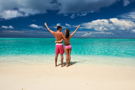 Couple on a tropical beach at Maldives