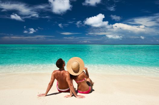 Couple on a tropical beach at Maldives