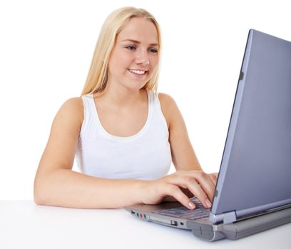 Attractive young woman using laptop. All on white background.