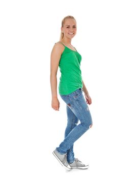 Full length shot of an attractive teenage girl walking by feet. All on white background.