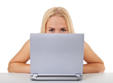 Attractive young woman using laptop. All on white background.